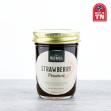 Jar of Old Mill Strawberry Preserves with gold lid on a white background, featuring 'Made in TN' label.